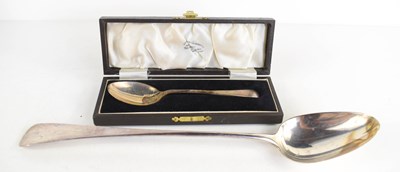 Lot 387 - A George III silver basting spoon, Thomas...