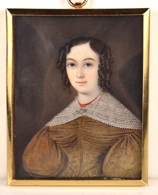 Lot 375 - A Georgian portrait miniature of a young lady...