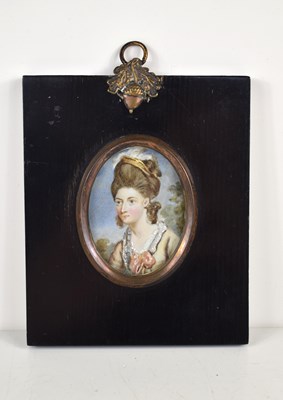 Lot 410 - A 19th century portrait miniature of a young...