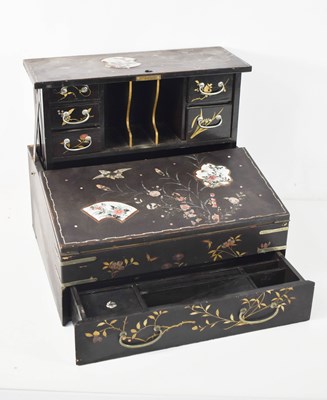 Lot 102 - A Japanese black lacquered writing box, the...