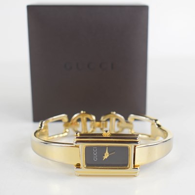 Lot 257 - A vintage Gucci mood watch, the signed...