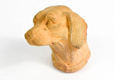 Lot 156 - A 19th century pottery dog head, possibly from...