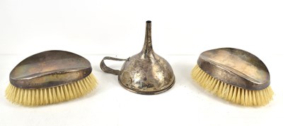 Lot 325 - A pair of silver handled clothes brushes...