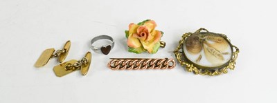 Lot 333 - A rose gold chain link bar brooch, with metal...