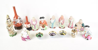 Lot 105 - A group of Chinese and Japanese figures and...