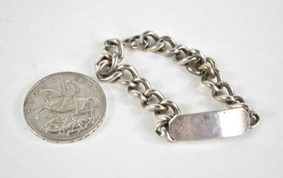 Lot 350 - A silver chain link identity bracelet, with...