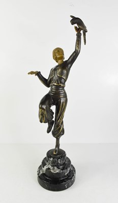 Lot 220 - An Art Deco style bronze patinated figurine of...