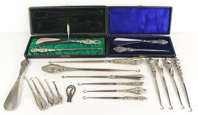 Lot 366 - A collection of various silver button hooks...