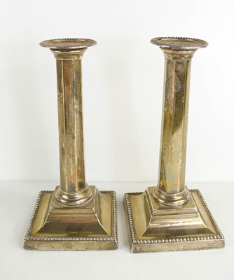 Lot 403 - A pair of Victorian silver candlesticks, of...