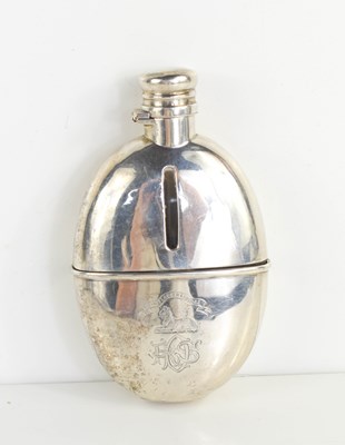 Lot 402 - A Victorian silver hip-flask, of small oval...