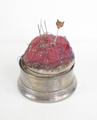 Lot 354 - A silver pin-cushion box with engine turned...