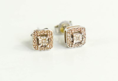 Lot 231 - A pair of 9ct white gold and diamond earrings,...