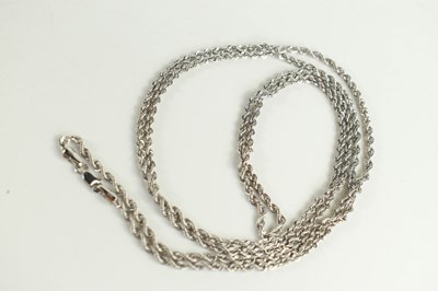 Lot 85 - A 9ct white gold ropetwist necklace, with crab...