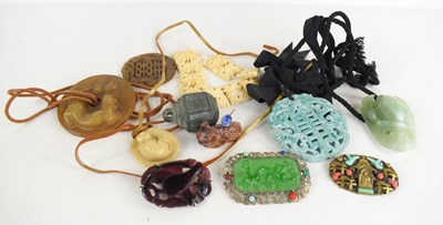 Lot 326 - A collection of Chinese pendants and jewellery...