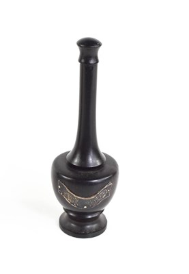 Lot 204 - An 18th century ebony travelling pestle and...