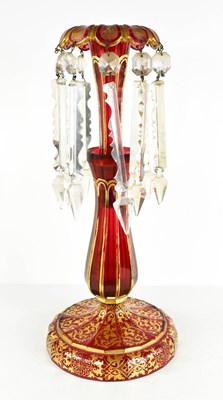 Lot 56 - A Victorian cranberry glass lustre, with...