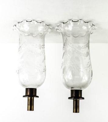 Lot 68 - A pair of early 20th century glass etched lamp...