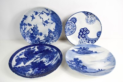 Lot 35 - A group of four Chinese blue and white plates...
