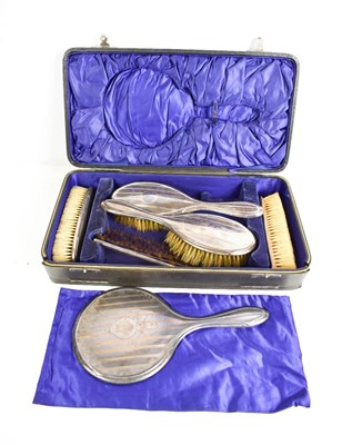 Lot 321 - A Geroge V silver dressing table set, Daniel...