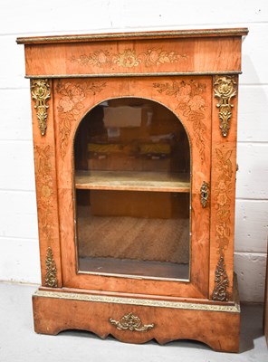 Lot 457 - A 19th century walnut veneered pier cabinet,...