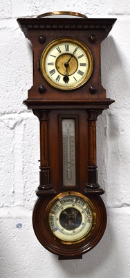 Lot 387 - A late 19th century German walnut wall clock...