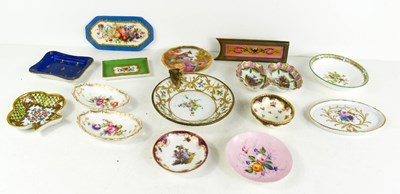 Lot 49 - A group of porcelain dishes, 19th century and...