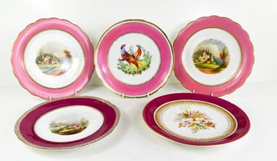 Lot 12 - A group of five porcelain plates, all with...