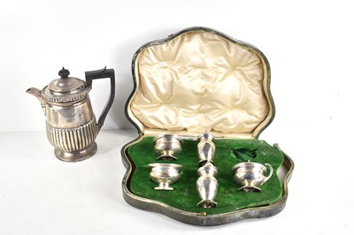 Lot 410 - An Edwardian silver coffee pot, the lower body...