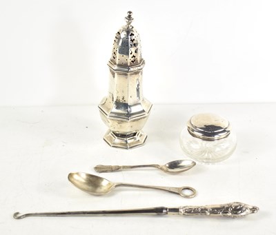 Lot 316 - A group of silver to include a silver sugar...