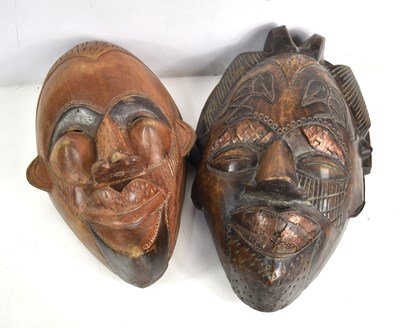 Lot 242 - Two large West African carved wooden tribal...