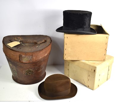 Lot 196 - An antique Dunlap & Co leather hat box...