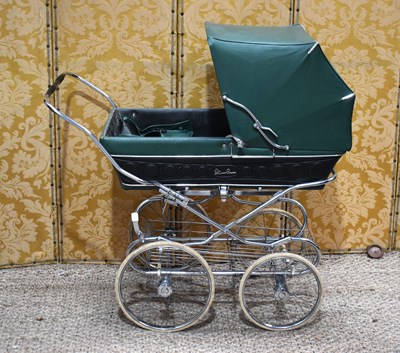 Lot 391 - A vintage Silver Cross pram in green and black...