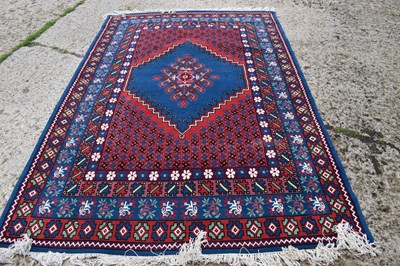 Lot 441 - A Tunisie woollen rug, blue ground with...