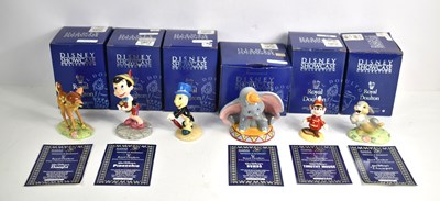 Lot 55 - A collection of Royal Doulton Disney Showcase...