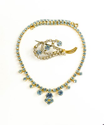 Lot 268 - A vintage paste necklace in blue, together...