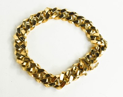 Lot 189 - A 9ct gold chain link bracelet, with a slide...