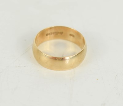 Lot 81 - A 9ct gold wedding band, size M, 2.95g.