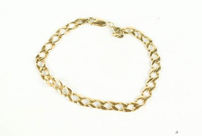 Lot 129 - A 9ct gold flat chain link bracelet with crab...