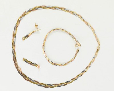 Lot 135 - A 9ct yellow, white and rose gold plaited...