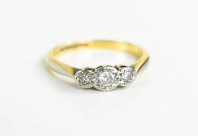 Lot 156 - An 18ct gold, platinum and diamond three stone...