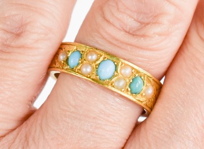 Lot 27 - A gold, turquoise and seed pearl ring,...