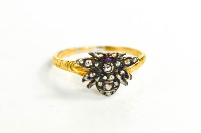 Lot 34 - A rose cut diamond and pink ruby ring in the...