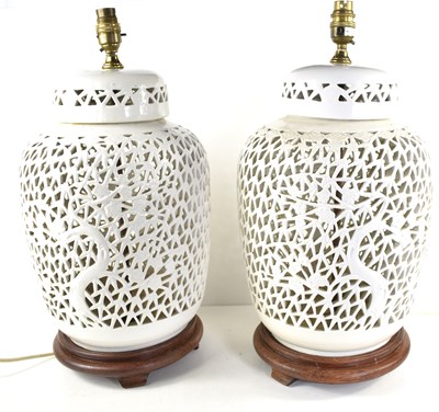 Lot 144 - A pair of Chinese Blanc de Chine lamp bases...