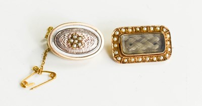 Lot 149 - Two Victorian gold mourning brooches, one of...