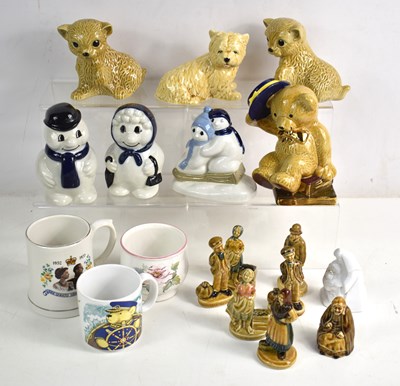 Lot 122 - A group of Wade pottery and figures to include...