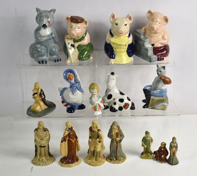 Lot 116 - A group of Wade ceramic figures to include...