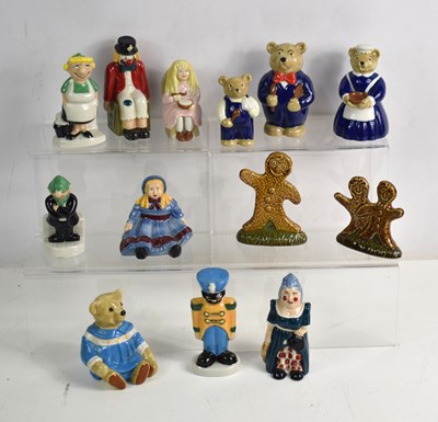 Lot 109 - A group of Wade figurines to include...