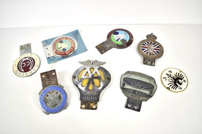 Lot 190 - A collection of vintage car badges to include...