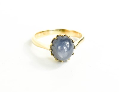 Lot 45 - A 9ct gold and star sapphire set ring, oval...