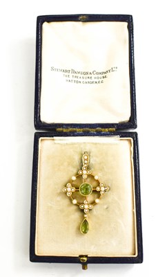 Lot 47 - A 15ct gold, seed pearl and peridot set...